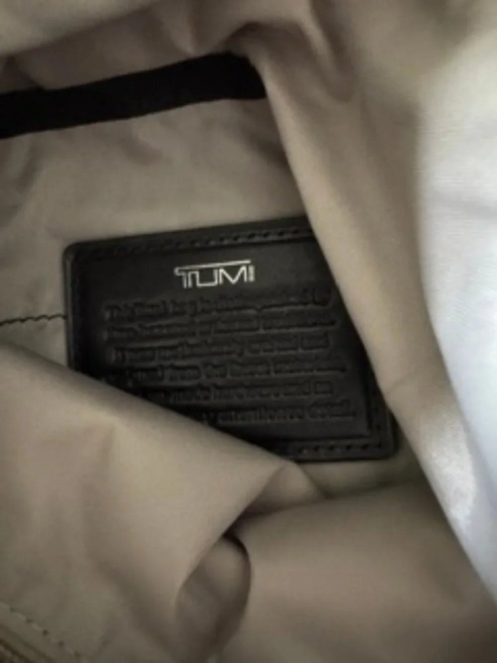 Tumi cross body bag